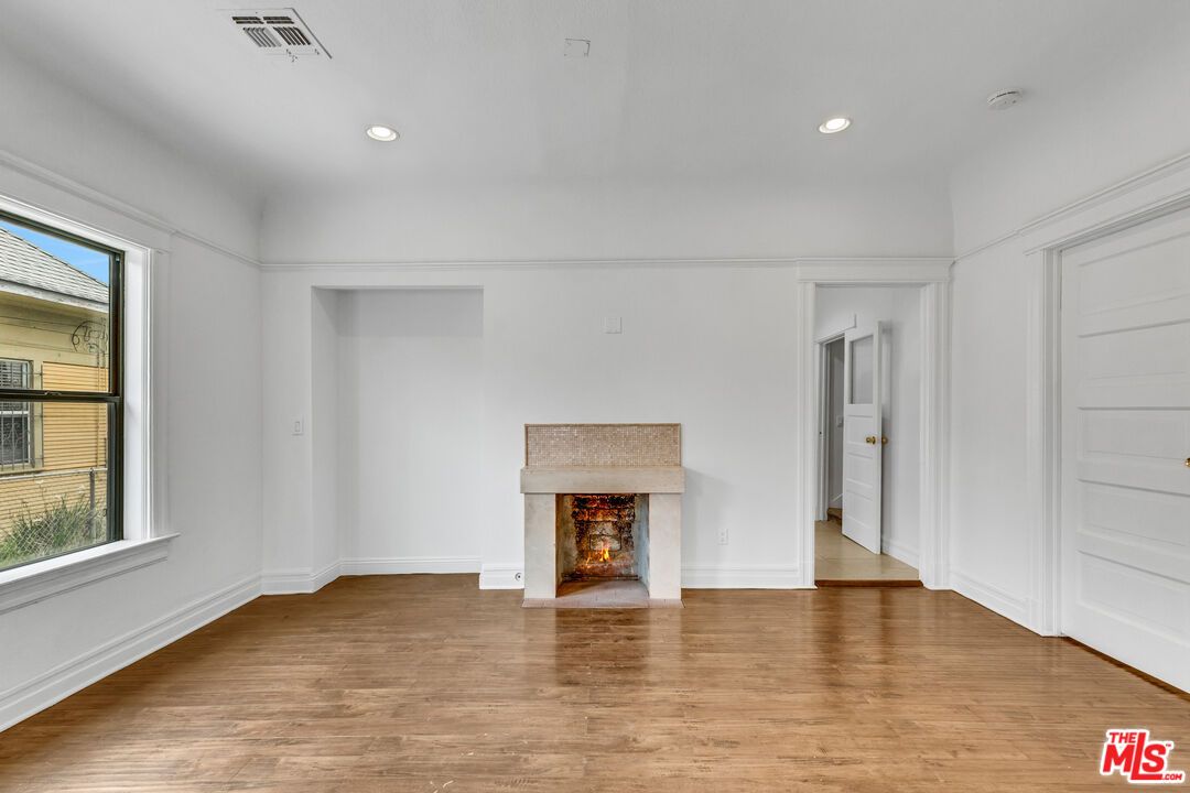 Empty room, Fireplace, Interior, Recessed Lighting, Wood Texture Flooring