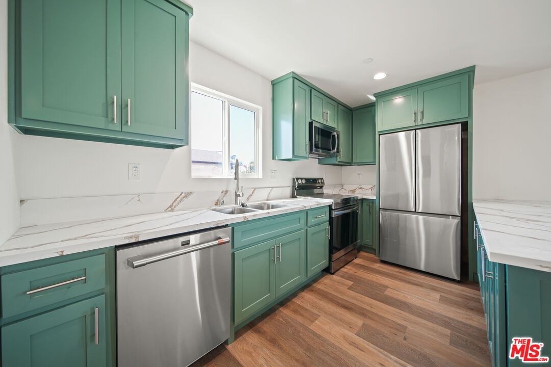 Interior, Kitchen, Recessed Lighting, Stainless Steel Appliances, Wood Texture Flooring