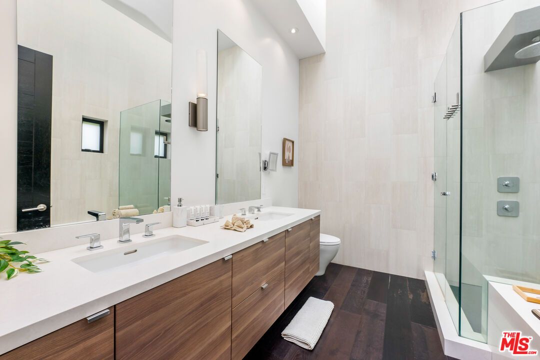 Bathroom, Dual Sink Vanities, Glass Shower, Interior, Recessed Lighting, Wood Texture Flooring