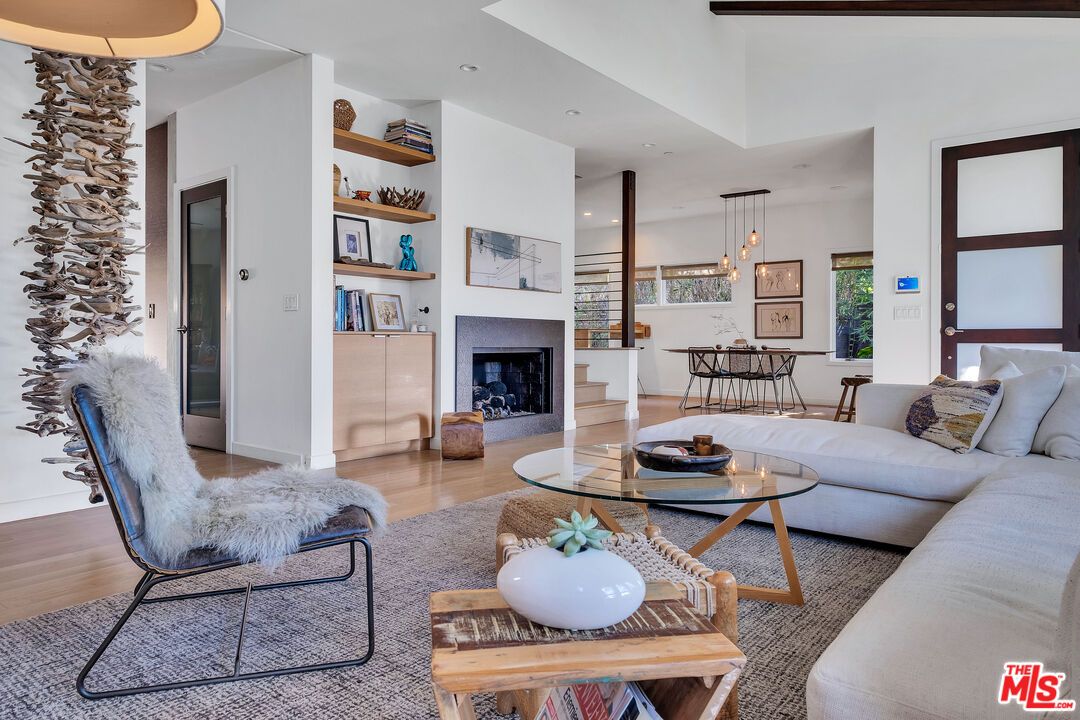 Dining room, Fireplace, Interior, Living room, Pendant Lights, Recessed Lighting, Wood Texture Flooring