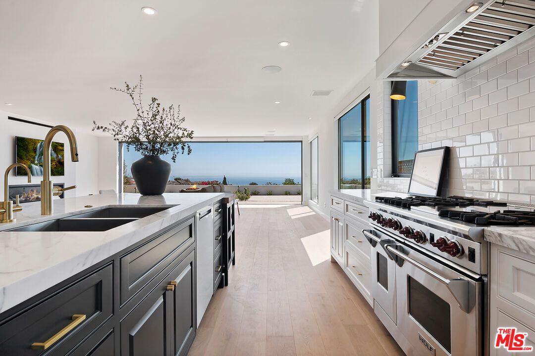 Interior, Kitchen, Recessed Lighting, Stainless Steel Appliances, Water, Wood Texture Flooring