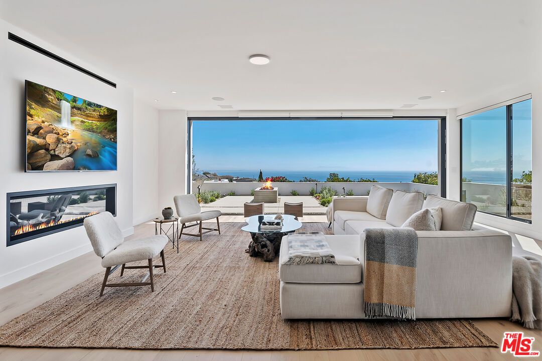 Fireplace, Interior, Living room, Recessed Lighting, Water, Wood Texture Flooring