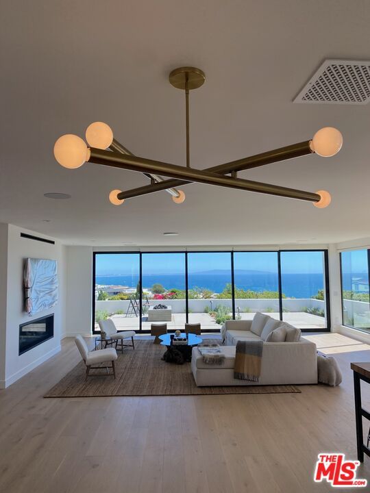 Fireplace, Interior, Living room, Pendant Lights, Water, Wood Texture Flooring