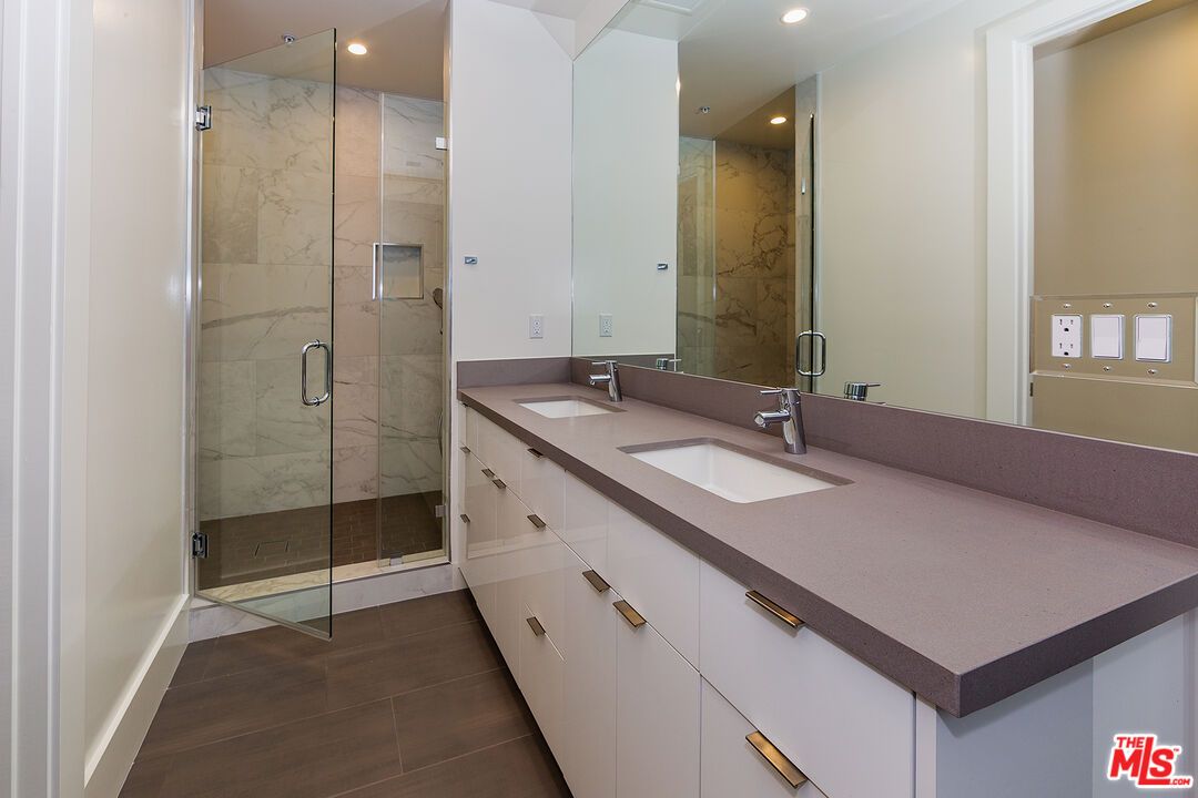 Bathroom, Dual Sink Vanities, Glass Shower, Interior, Marble Walls, Recessed Lighting