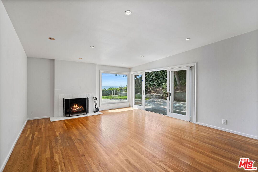 Empty room, Fireplace, Interior, Recessed Lighting, Wood Texture Flooring