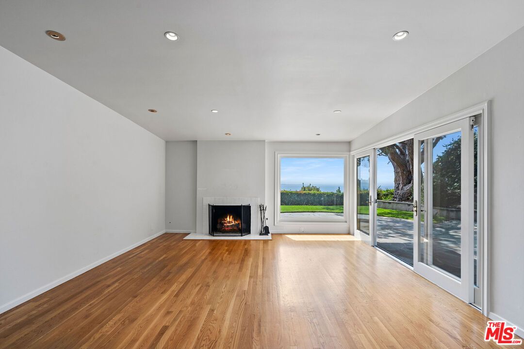 Empty room, Fireplace, Interior, Recessed Lighting, Wood Texture Flooring