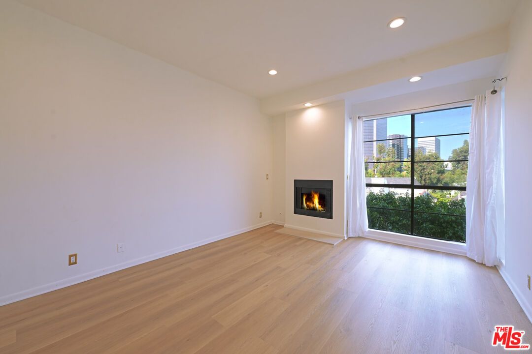 Empty room, Fireplace, Interior, Recessed Lighting, Wood Texture Flooring