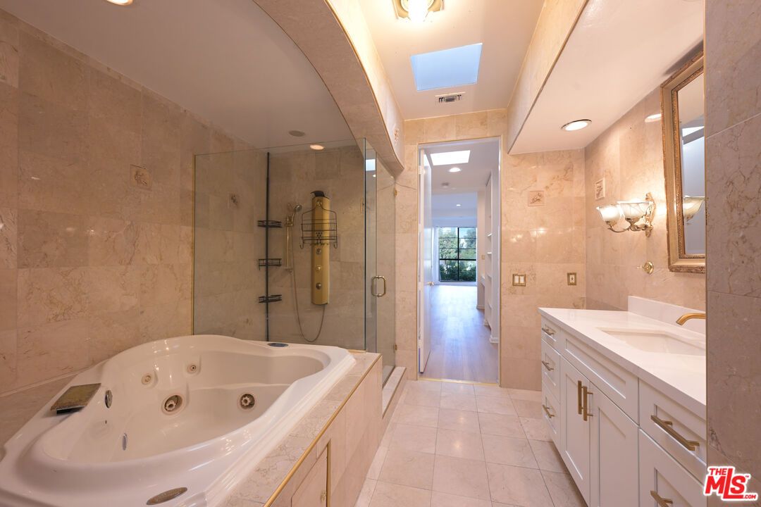 Bathroom, Dual Sink Vanities, Glass Shower, Interior, Recessed Lighting, Wood Texture Flooring