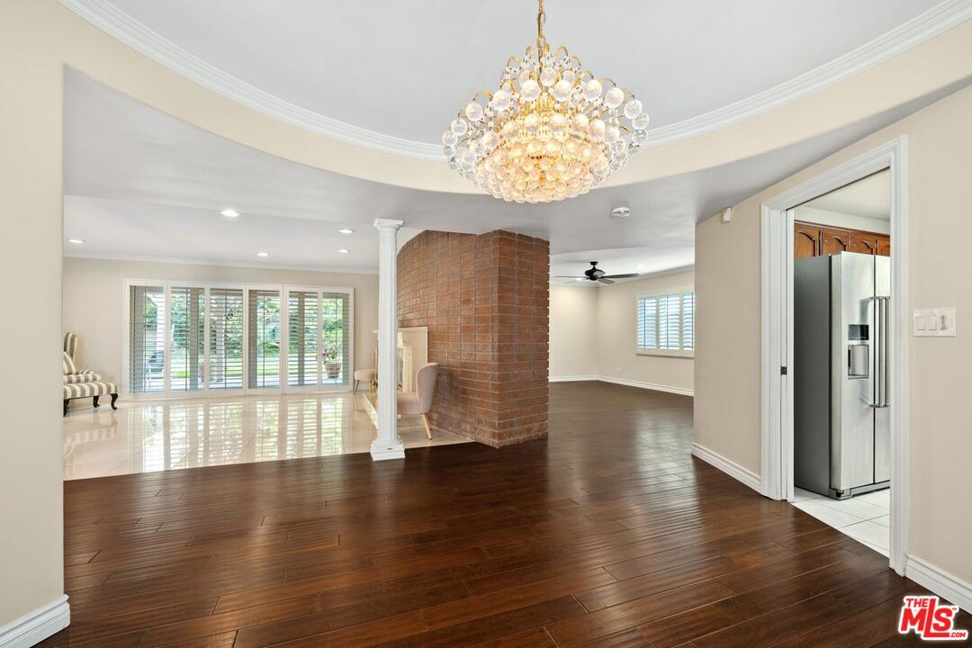 Chandelier, Empty room, Interior, Kitchen, Recessed Lighting, Stainless Steel Appliances, Wood Texture Flooring