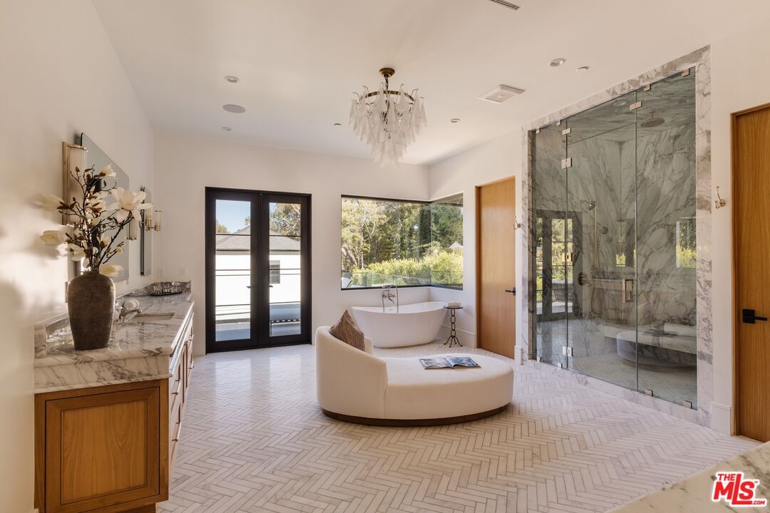 Bathroom, Chandelier, Free Standing Baths, Glass Shower, Interior, Marble, Marble Walls, Recessed Lighting