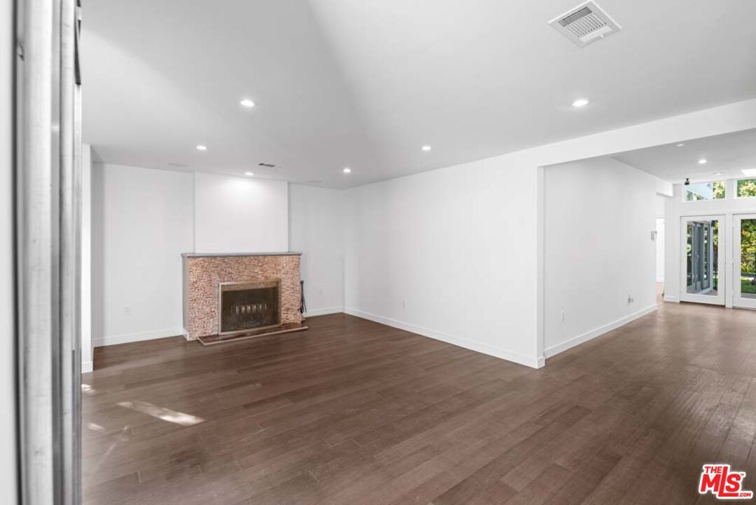 Empty room, Fireplace, Interior, Recessed Lighting, Wood Texture Flooring
