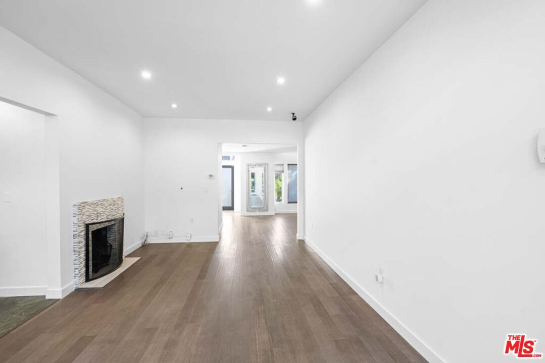 Empty room, Fireplace, Interior, Recessed Lighting, Wood Texture Flooring