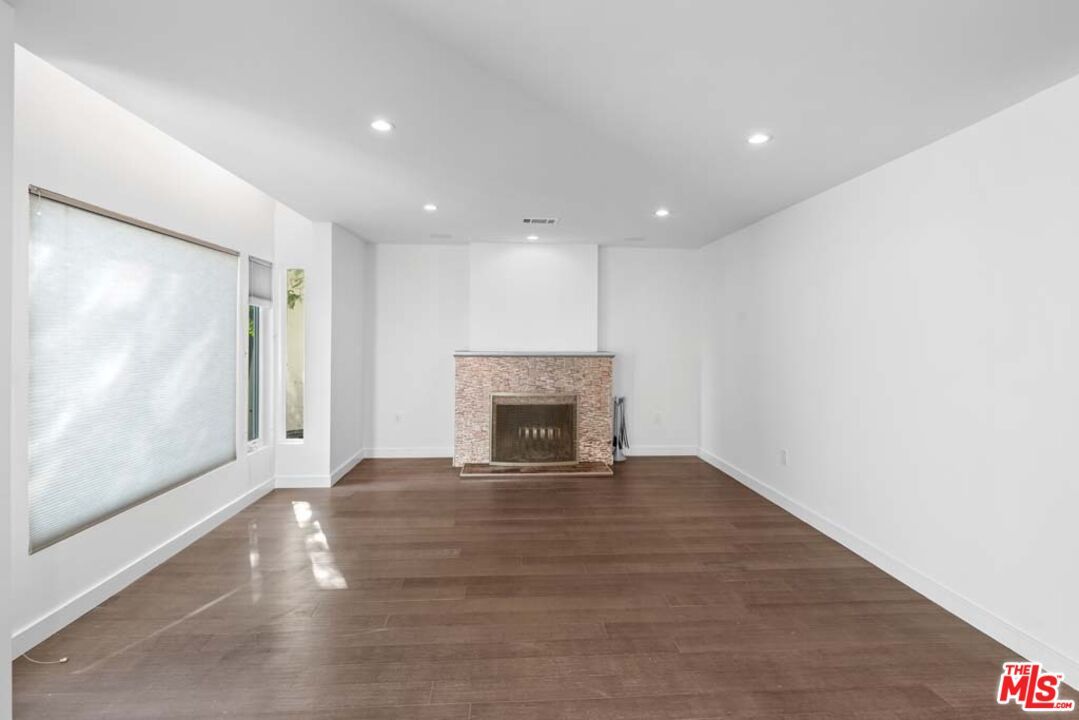 Empty room, Fireplace, Interior, Recessed Lighting, Wood Texture Flooring