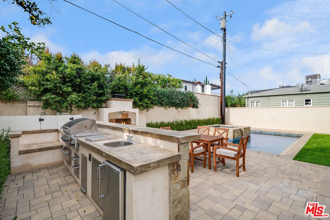 Exterior, Fireplace, Outdoor Kitchen, Pool