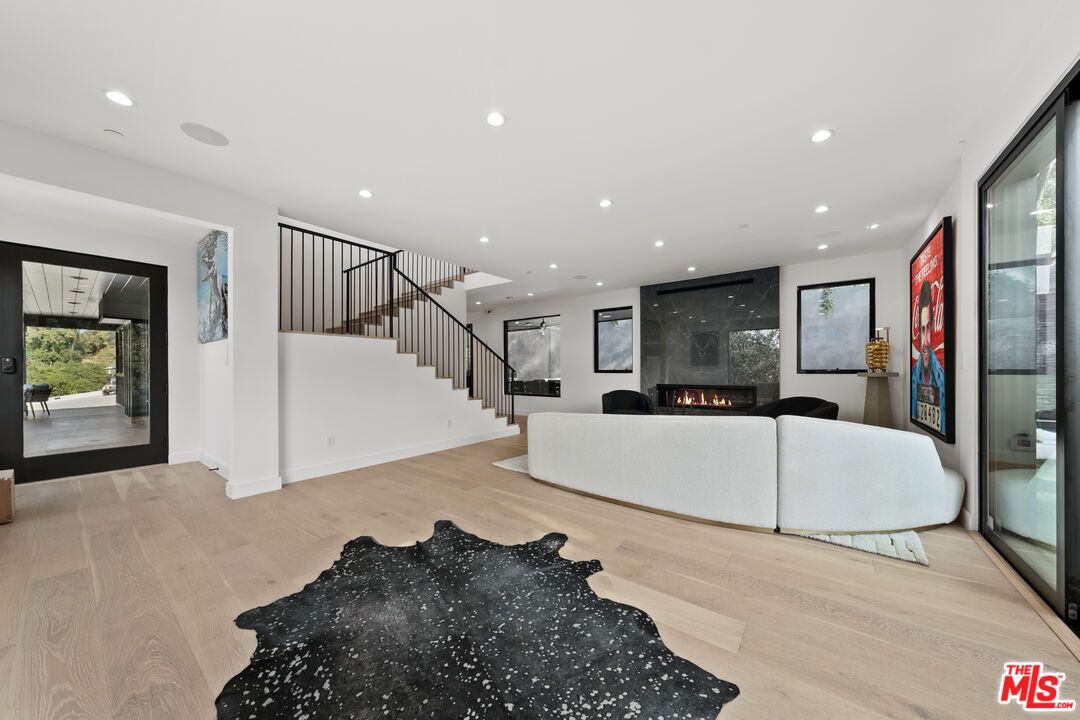 Fireplace, Interior, Living room, Recessed Lighting, Wood Texture Flooring