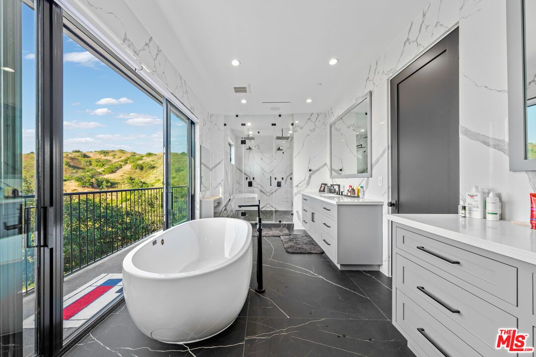 Bathroom, Dual Sink Vanities, Free Standing Baths, Interior, Marble, Marble Walls, Recessed Lighting