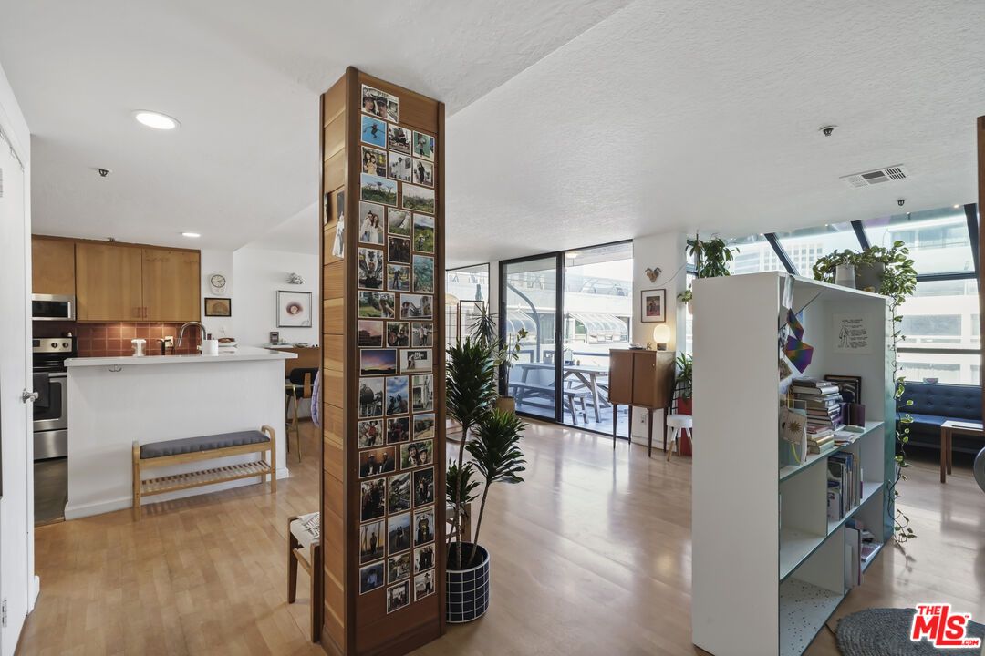 Dining room, Interior, Kitchen, Recessed Lighting, Stainless Steel Appliances, Wood Texture Flooring