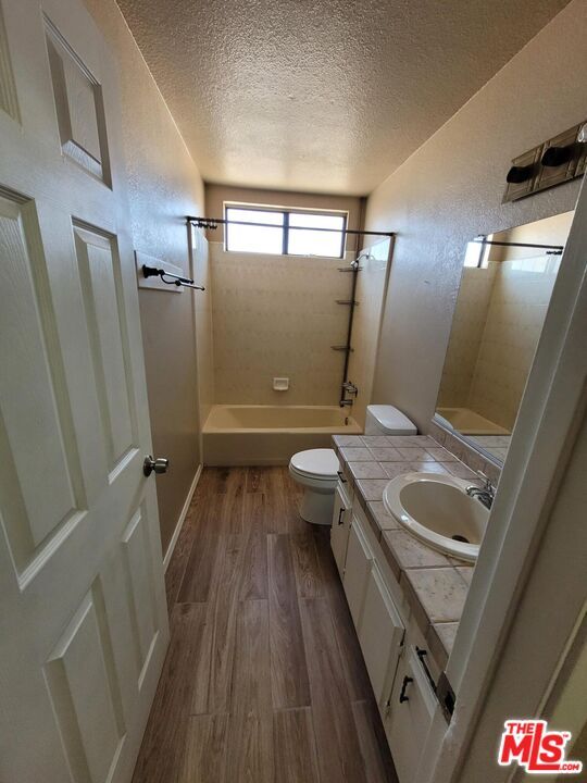 Bathroom, Dual Sink Vanities, Interior, Tile Countertops, Wood Texture Flooring