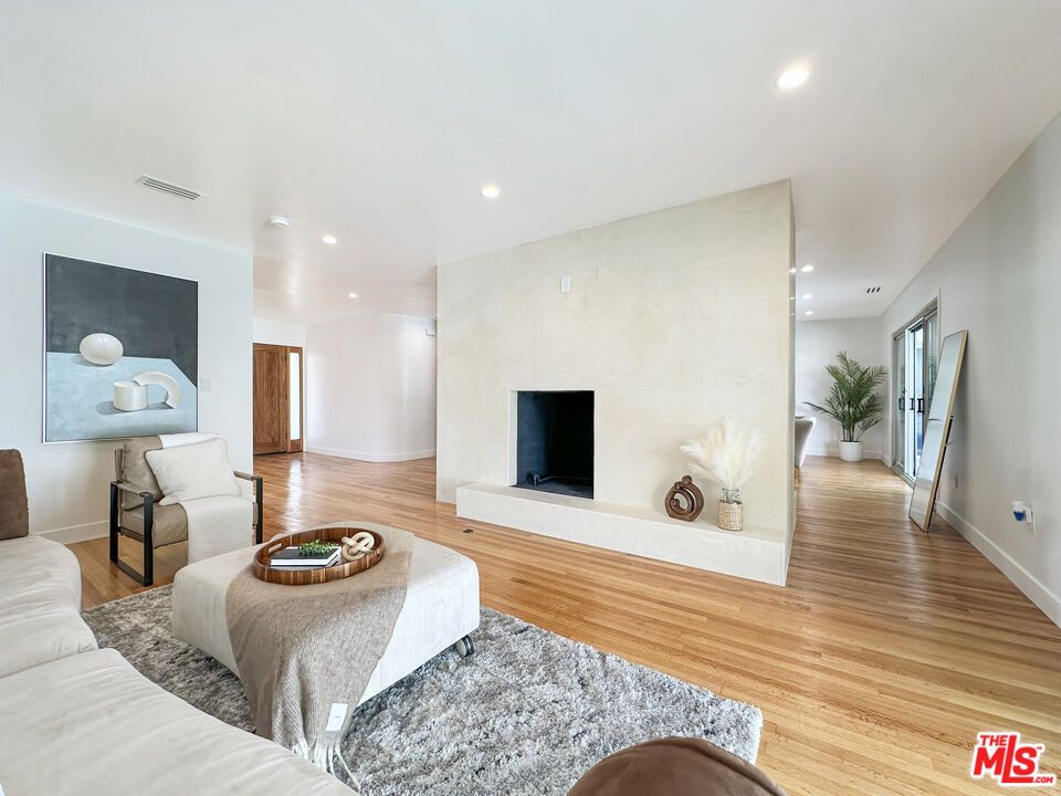 Fireplace, Interior, Living room, Recessed Lighting, Wood Texture Flooring