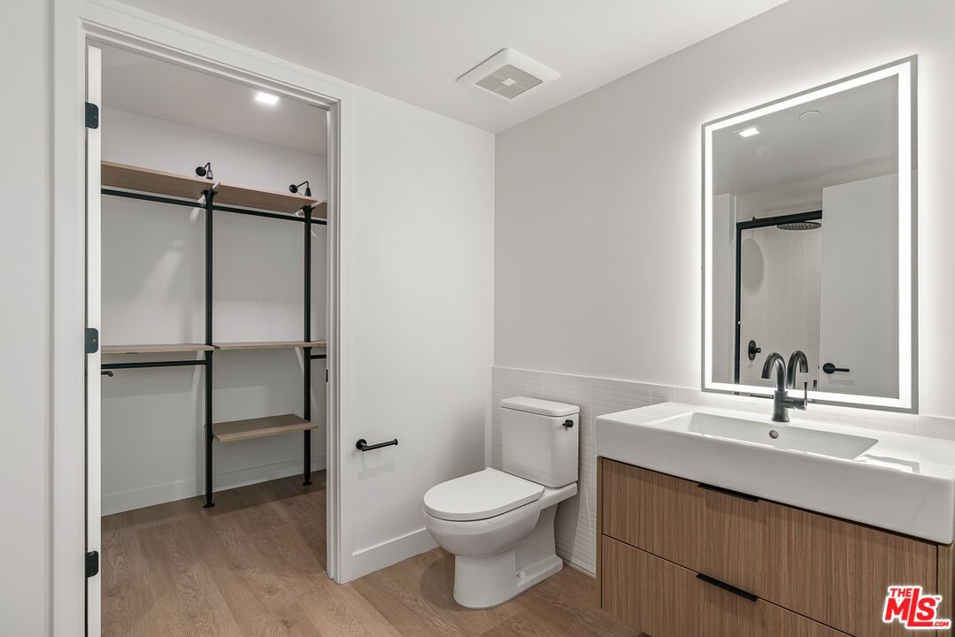 Bathroom, Glass Shower, Interior, Recessed Lighting, Wood Texture Flooring