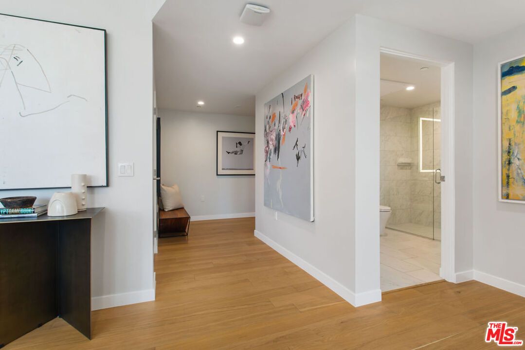 Bathroom, Glass Shower, Interior, Marble Walls, Recessed Lighting, Wood Texture Flooring