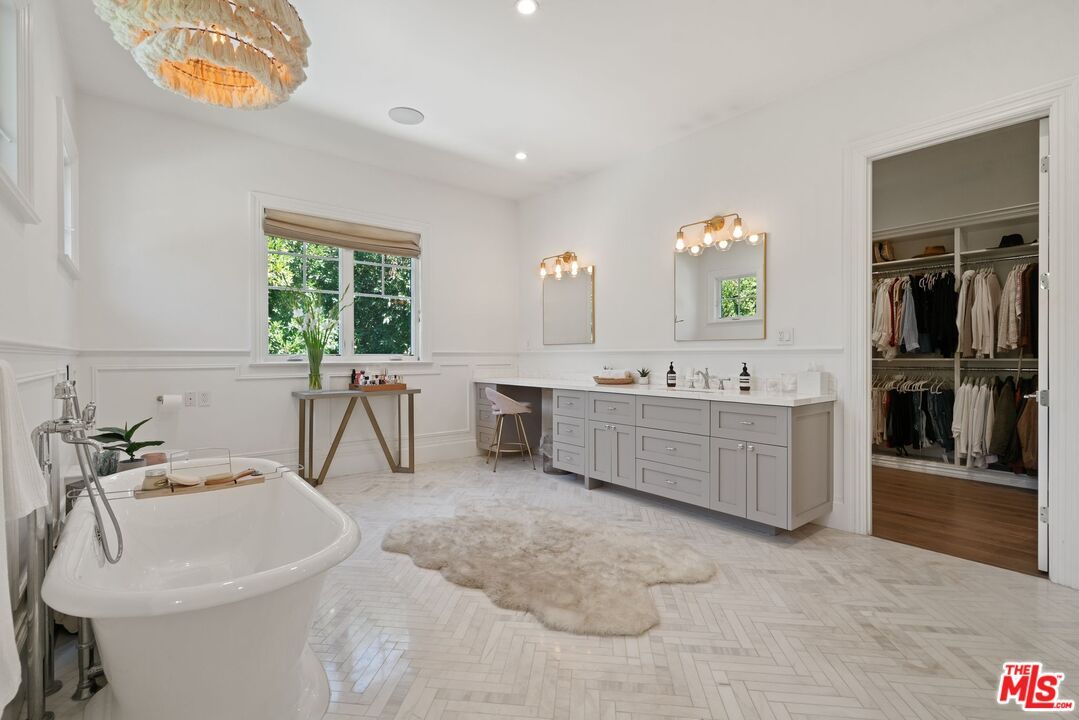 Bathroom, Chandelier, Dual Sink Vanities, Free Standing Baths, Interior, Recessed Lighting, Walk-in Closets, Wood Texture Flooring