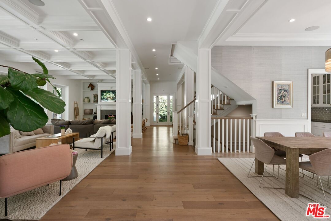 Dining room, Fireplace, Interior, Living room, Recessed Lighting, Wood Texture Flooring