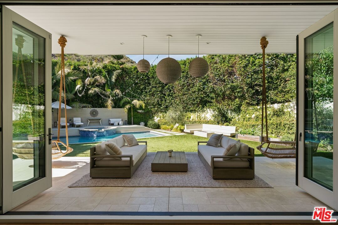 Exterior, Outdoor Kitchen, Pendant Lights, Pool