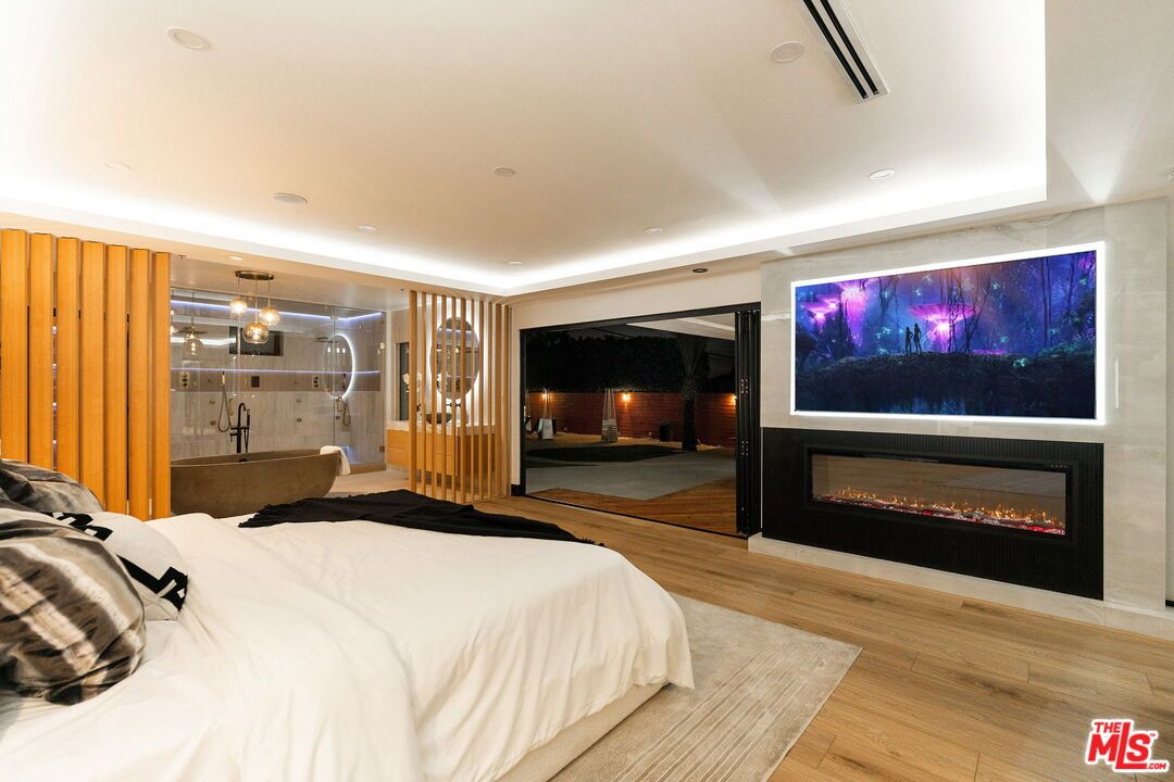 Bedroom, Fireplace, Interior, Recessed Lighting, Wood Texture Flooring