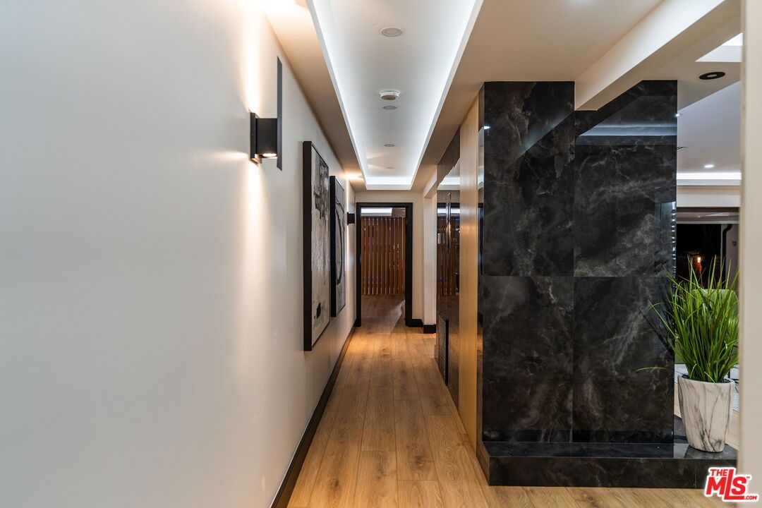 Interior, Marble Walls, Recessed Lighting, Wood Texture Flooring