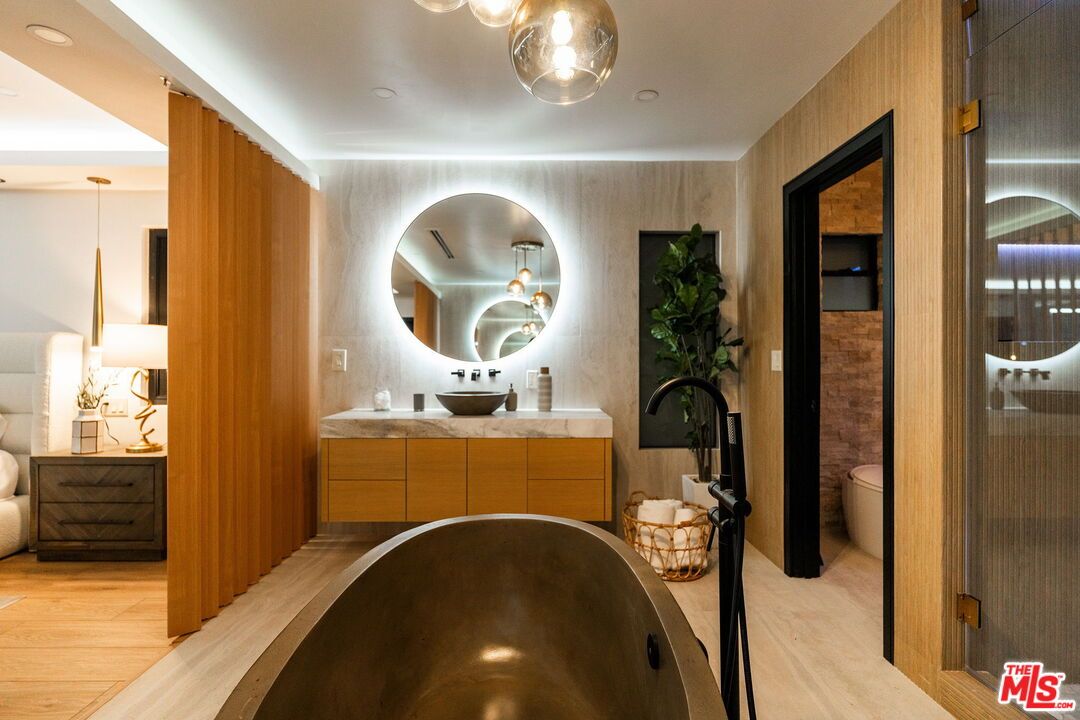 Bathroom, Dual Sink Vanities, Interior, Pendant Lights, Recessed Lighting, Wood Texture Flooring