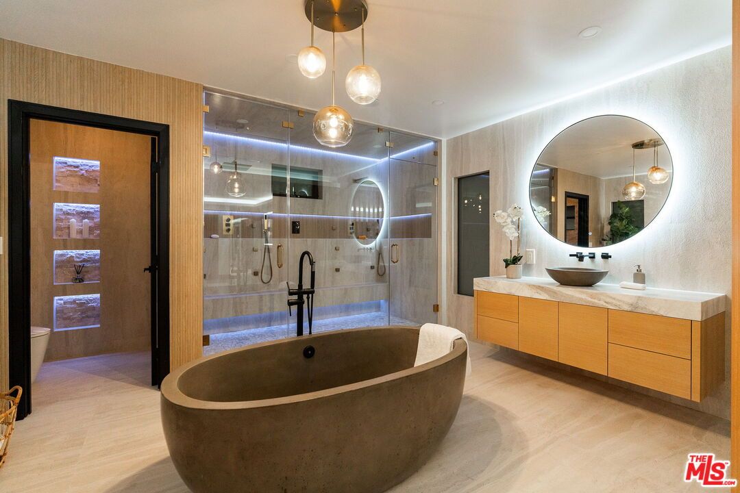 Bathroom, Dual Sink Vanities, Free Standing Baths, Glass Shower, Interior, Pendant Lights, Wood Texture Flooring
