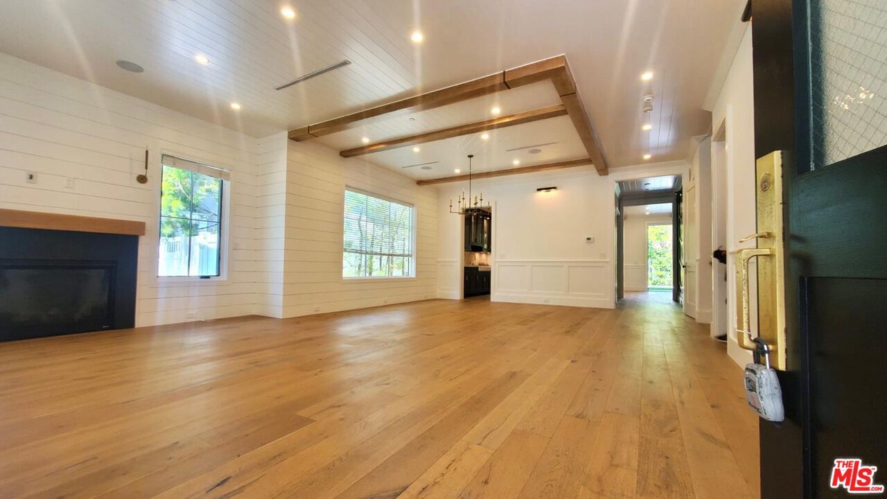 Empty room, Fireplace, Interior, Recessed Lighting, Wooden Beams, Wood Texture Flooring