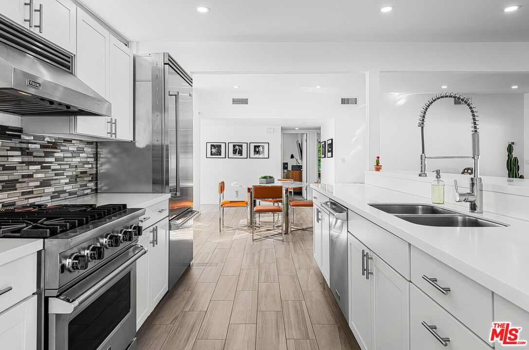 Dining room, Interior, Kitchen, Recessed Lighting, Stainless Steel Appliances, Wood Texture Flooring