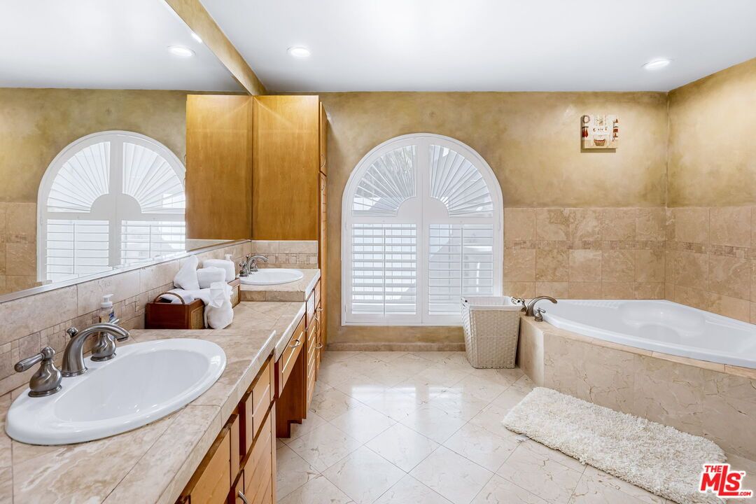 Bathroom, Dual Sink Vanities, Interior, Recessed Lighting, Tile Countertops