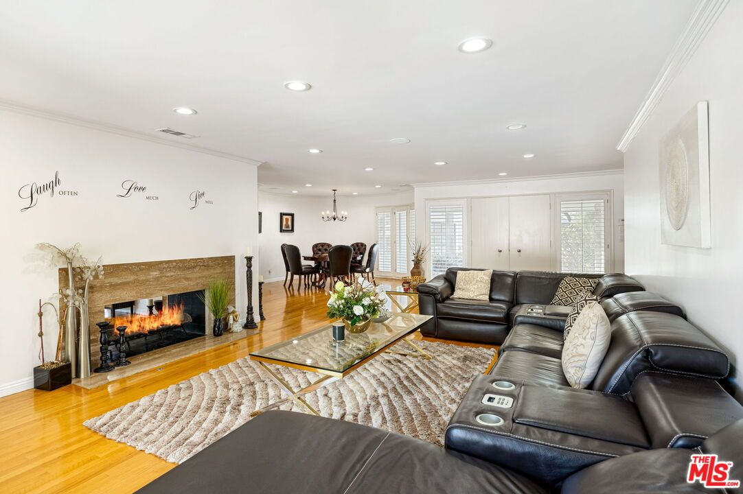 Chandelier, Dining room, Fireplace, Interior, Living room, Recessed Lighting, Wood Texture Flooring