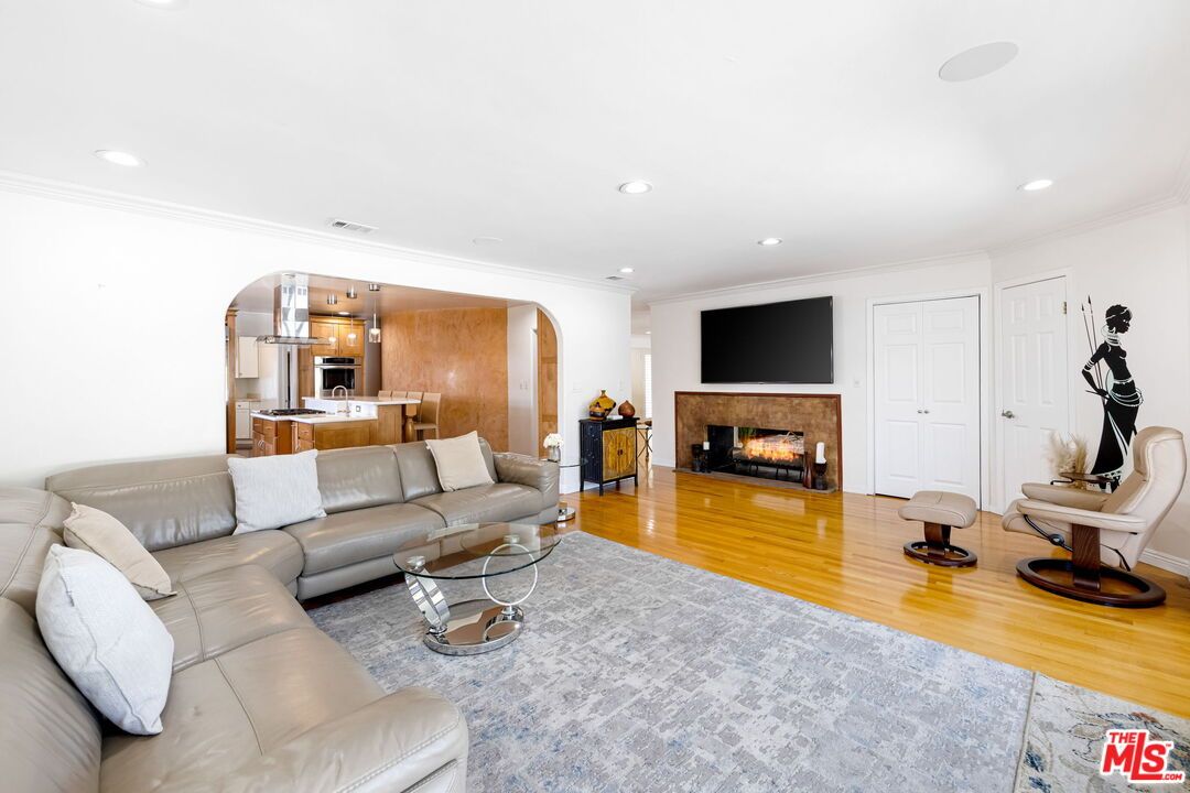 Fireplace, Interior, Kitchen, Living room, Recessed Lighting, Wood Texture Flooring