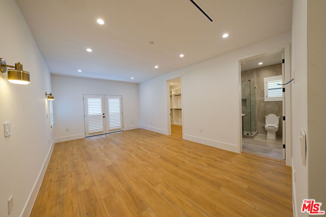 Bathroom, Empty room, Glass Shower, Interior, Recessed Lighting, Wood Texture Flooring