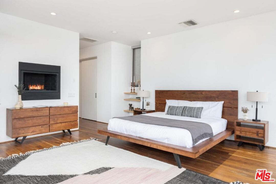 Bedroom, Fireplace, Interior, Recessed Lighting, Wood Texture Flooring