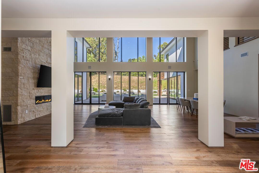 Dining room, Fireplace, Interior, Living room, Stone Walls, Wood Texture Flooring