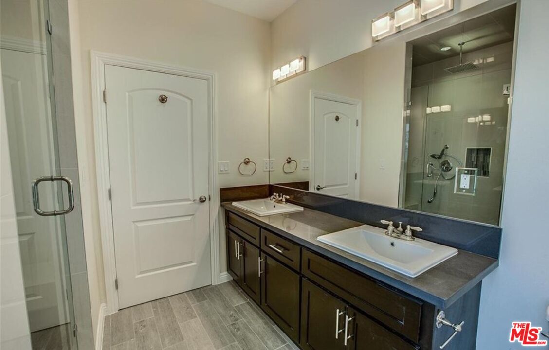 Bathroom, Dual Sink Vanities, Glass Shower, Interior, Wood Texture Flooring