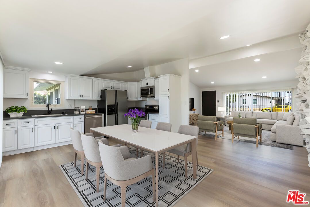 Dining room, Interior, Kitchen, Living room, Recessed Lighting, Stainless Steel Appliances, Wood Texture Flooring