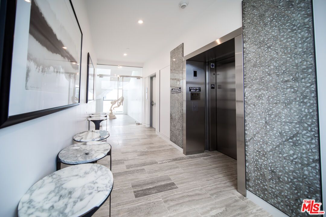 Elevator, Interior, Recessed Lighting, Wood Texture Flooring