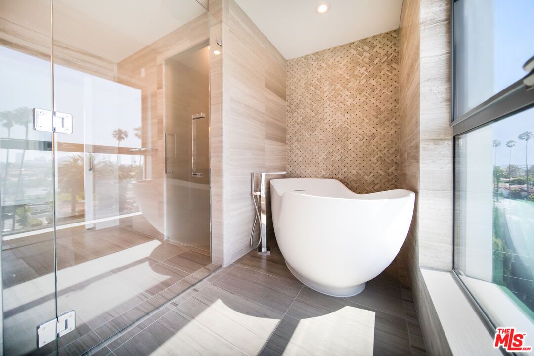 Bathroom, Free Standing Baths, Glass Shower, Interior, Recessed Lighting, Wood Texture Flooring