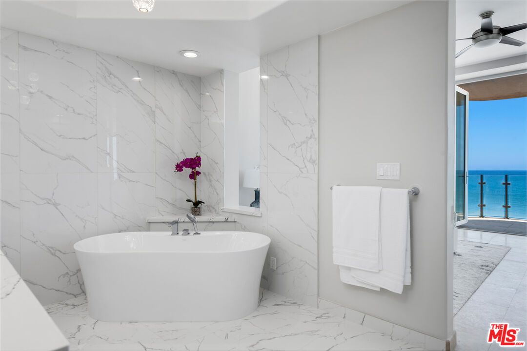 Bathroom, Free Standing Baths, Interior, Marble, Marble Walls, Recessed Lighting, Water