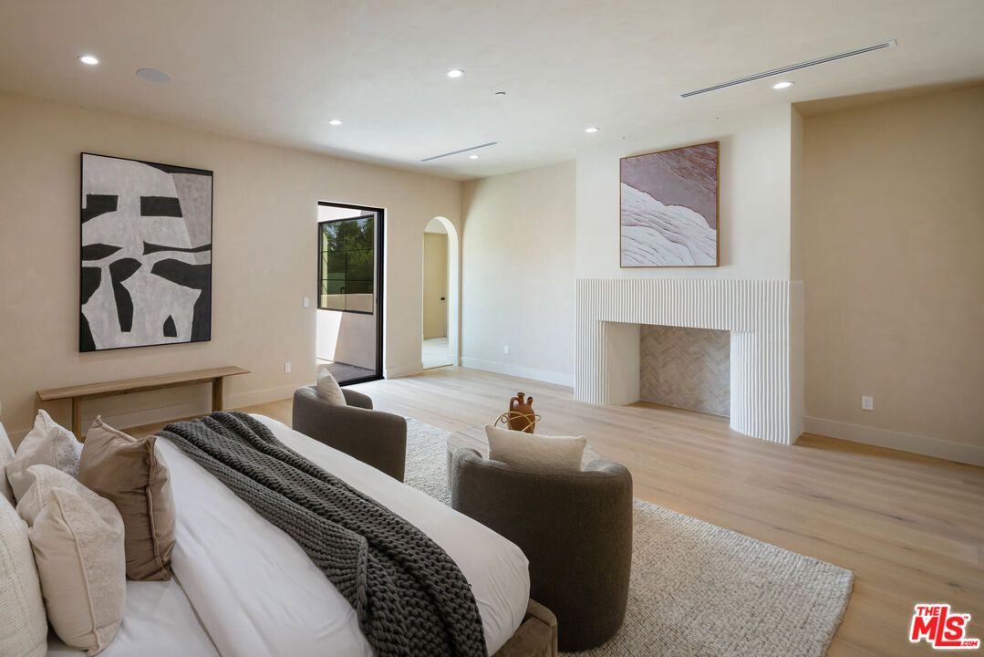 Bedroom, Fireplace, Interior, Recessed Lighting, Wood Texture Flooring