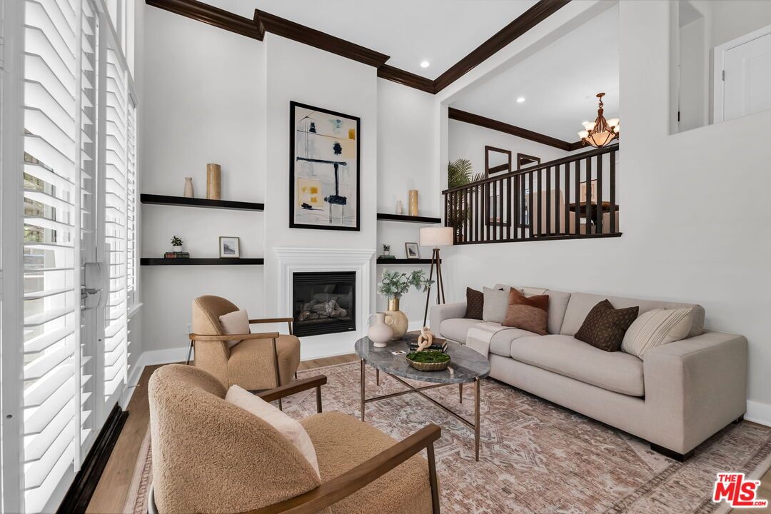 Chandelier, Fireplace, Interior, Living room, Recessed Lighting, Wood Texture Flooring