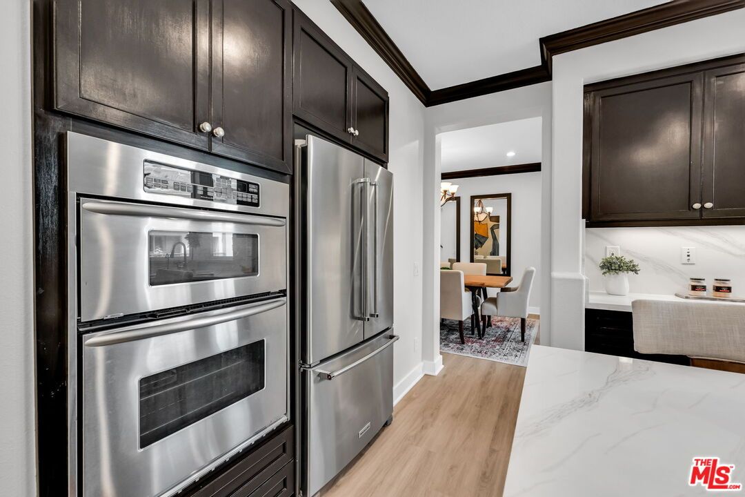Dining room, Interior, Kitchen, Recessed Lighting, Stainless Steel Appliances, Wood Texture Flooring