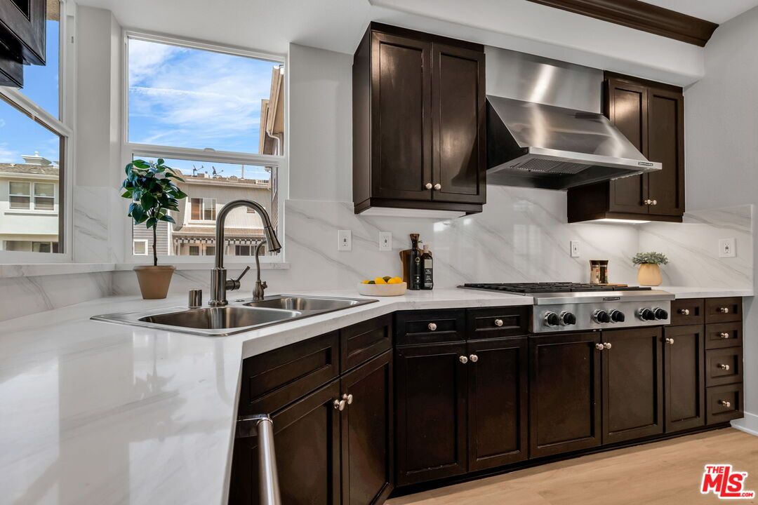 Interior, Kitchen, Marble Walls, Stainless Steel Appliances, Wood Texture Flooring