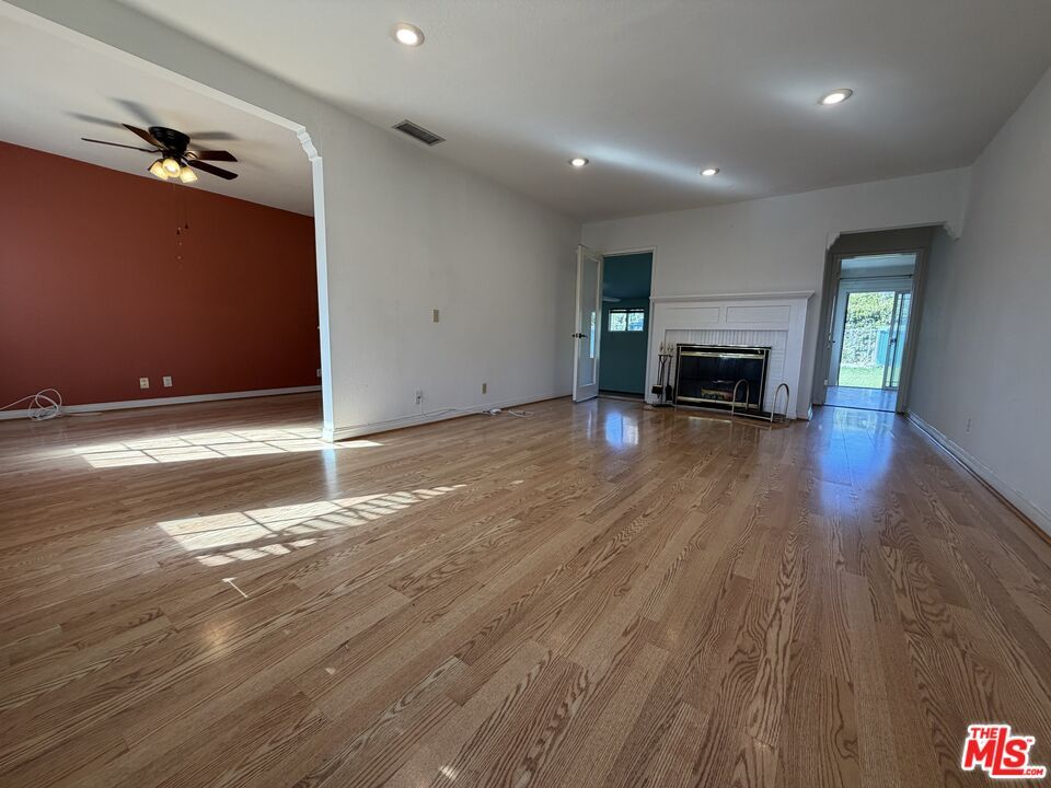 Empty room, Fireplace, Interior, Recessed Lighting, Wood Texture Flooring